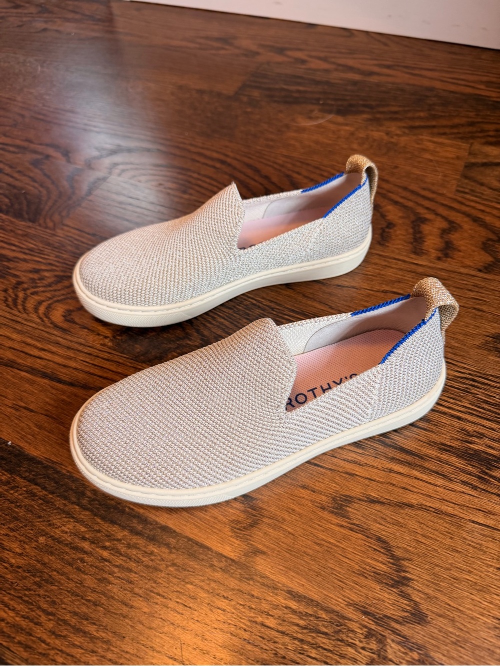 Rothy's Kids Slip-On Knit Sneakers in Light Gold with Blue Trim